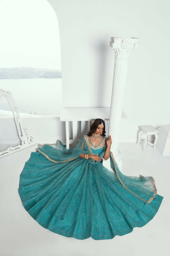 Aastha Fashion Rama Green Butterfly Net Tone To Tone Cotton Thread Work And Sequence Work Embroidery Wedding Wear Lehenga Choli