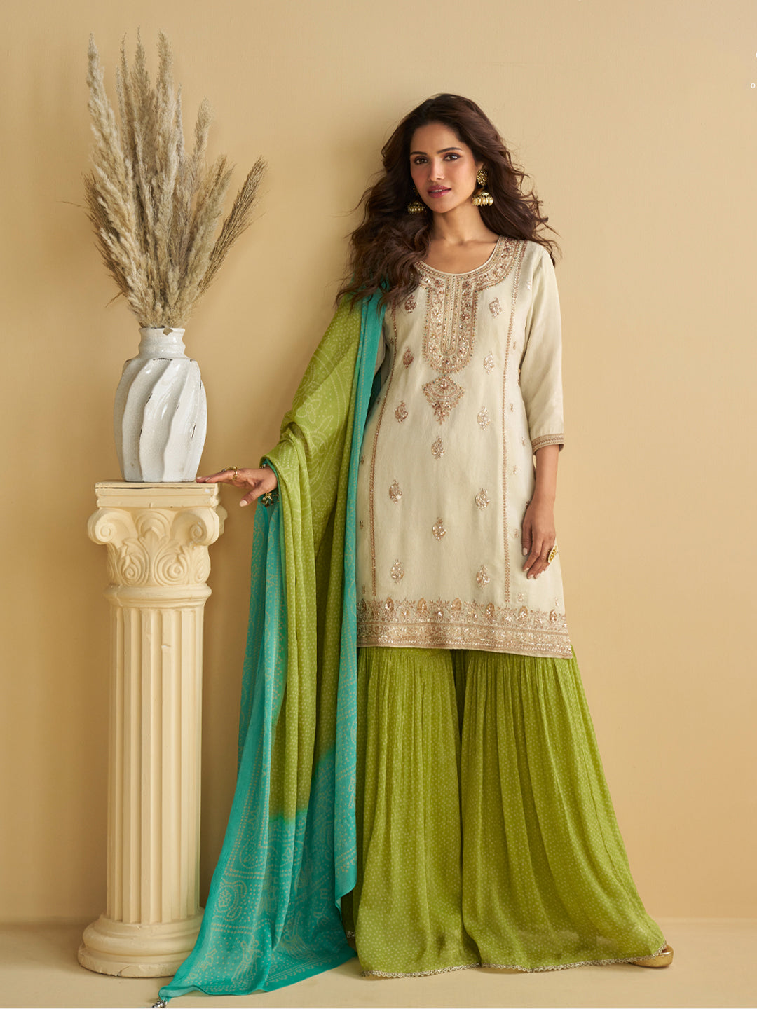 Evanik Women Off White Chinon Silk Zari Embroidered Sequins Sharara Suit