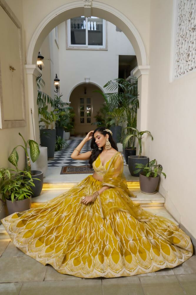 Aastha Fashion Mustard Yellow Butterfly Net White Cotton Thread Work And Sequence Work Embroidery Wedding Wear Lehenga Choli