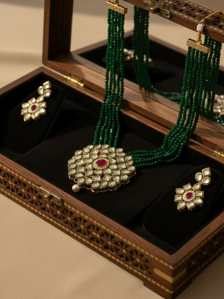 NVR Women Gold Plated Green Kundan Jewellery Set